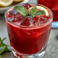 Naturally vibrant pink lemonade with beet, a refreshing summer drink.
